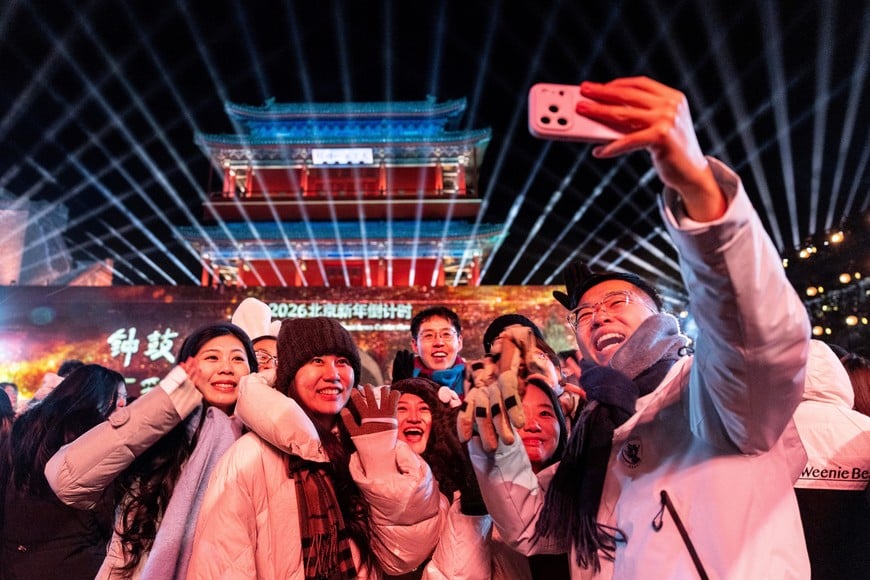 People gather at a New Year countdown ceremony at Juyongguan Great Wall section, also known as Juyong Pass, in Beijing, China, December 31, 2025. REUTERS/Maxim Shemetov