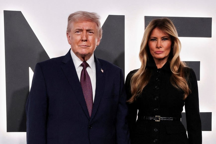 U.S. President Donald Trump and his wife Melania arrive for the premiere of the documentary film "Melania" at the John F. Kennedy Center for the Performing Arts, recently renamed to include U.S. President Donald Trump's name, in Washington, D.C., U.S., January 29, 2026. REUTERS/Kylie Cooper