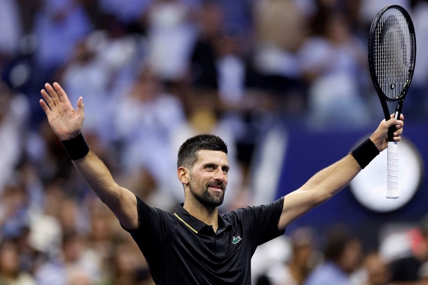 Tennis - U.S. Open - Flushing Meadows, New York, United States - August 24, 2025
Serbia's Novak Djokovic celebrates winning his first round match against Learner Tien of the U.S. REUTERS/Eduardo Munoz     TPX IMAGES OF THE DAY