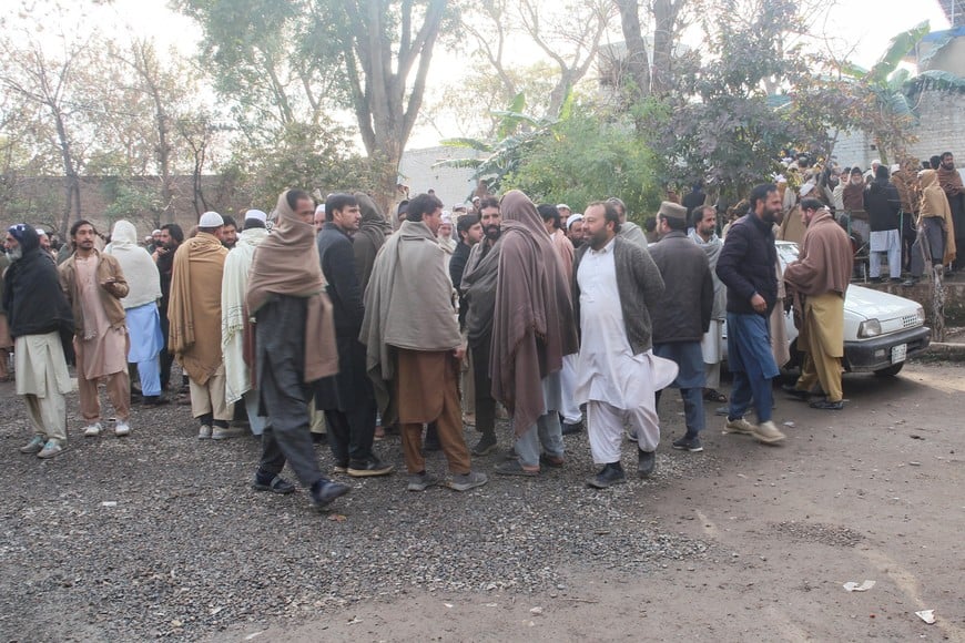 Residents from Tirah valley, who fled a remote mountainous region bordering Afghanistan, gather to get themself registered, in Bara, Khyber District of Khyber Pakhtunkhwa province, Pakistan, January 30, 2026. REUTERS/Muhammad Amin Afridi