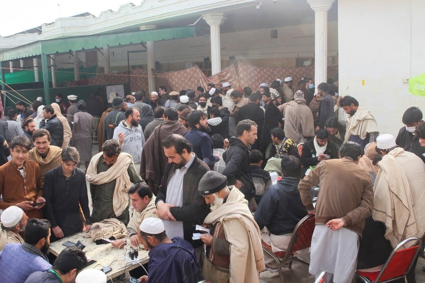 Residents from Tirah valley, who fled a remote mountainous region bordering Afghanistan, gather to get themself registered, in Bara, Khyber District of Khyber Pakhtunkhwa province, Pakistan, January 30, 2026. REUTERS/Muhammad Amin Afridi