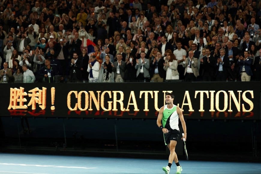 Tennis - Australian Open - Melbourne Park, Melbourne, Australia - February 1, 2026
Spain's Carlos Alcaraz celebrates after winning the Australian Open men's singles against Serbia's Novak Djokovic. Alcaraz becomes the youngest man to win all four grand slam titles. REUTERS/Tingshu Wang