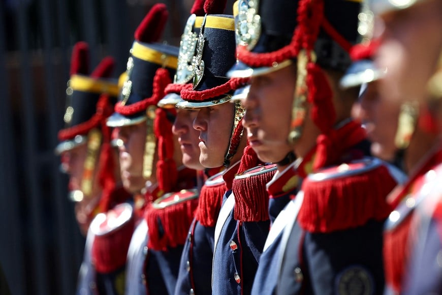 Members of the Granaderos honor guard regiment stand ahead of a wreath-laying ceremony on the day of Italy's Prime Minister Giorgia Meloni visit, at Plaza San Martin square, in Buenos Aires, Argentina November 20, 2024. REUTERS/Agustin Marcarian