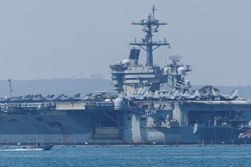 FILE PHOTO: The USS Abraham Lincoln (CVN-72), a Nimitz-class nuclear-powered aircraft carrier, is shown at Naval Air Station North Island in San Diego, California, U.S. August 11, 2025. REUTERS/Mike Blake/File Photo
