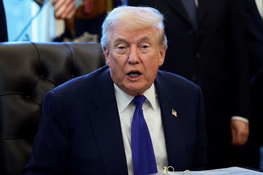 U.S. President Donald Trump speaks as he attends to sign an executive order in the Oval Office at the White House, February 2, 2026. REUTERS/Evelyn Hockstein