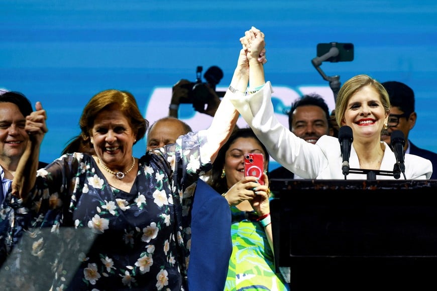 Presidential candidate Laura Fernandez of the Sovereign People's Party (PPSO) celebrates with Costa Rica's Deputy of the Legislative Assembly, Pilar Cisneros, as she leads the general election, in San Jose, Costa Rica, February 1, 2026. REUTERS/Raquel Cunha