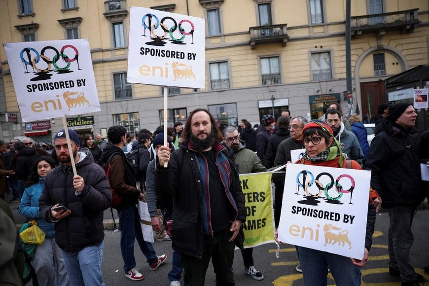 Demonstrators protest the environmental, economic and social impact of the Milano-Cortina 2026 Winter Olympics in Milan, Italy, February 7, 2026. REUTERS/Guglielmo Mangiapane