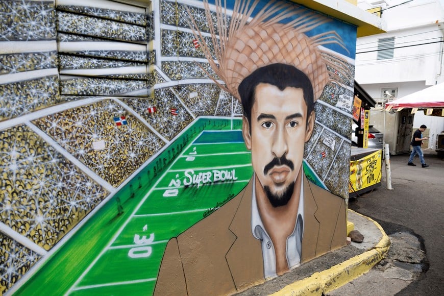 A mural portraying Puerto Rican singer Bad Bunny alongside Super Bowl-themed artwork is displayed in La Perla, Old San Juan, Puerto Rico, February 10, 2026. REUTERS/Ricardo Arduengo
NO RESALES. NO ARCHIVES