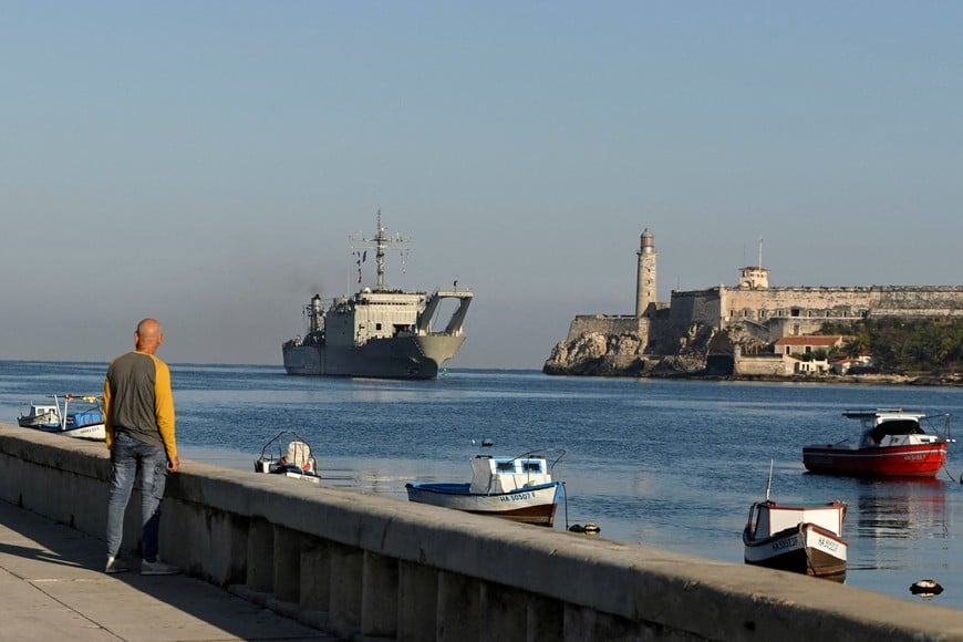 A man watches Mexican-flagged ship Papaloapan loaded with humanitarian aid entering Havana's bay days after the island's communist-run government announced increasingly strict rationing measures to confront U.S. efforts to cut off the island’s fuel supply, in Havana, Cuba February 12, 2026. REUTERS/Norlys Perez TPX IMAGES OF THE DAY