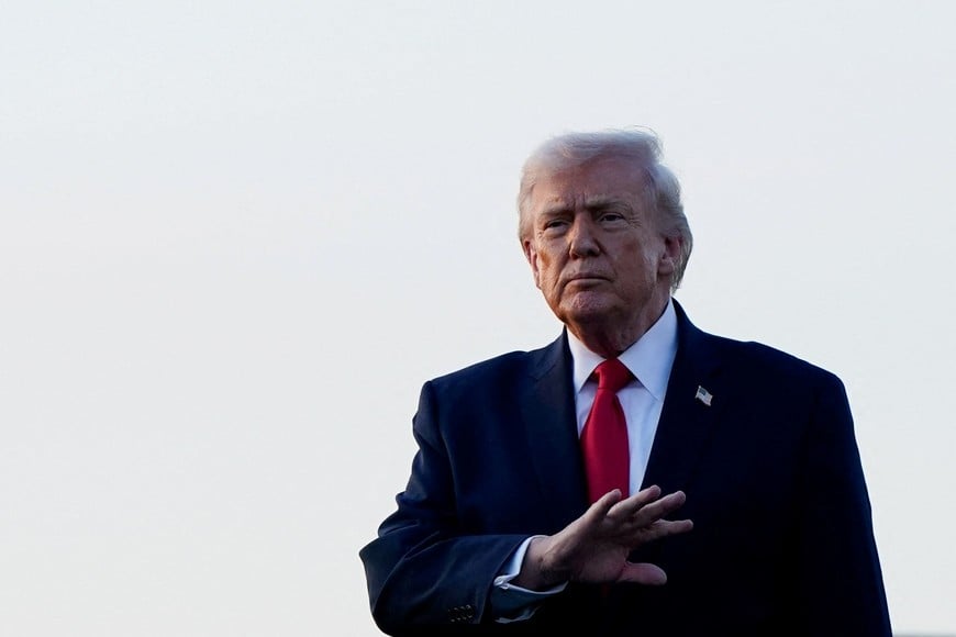 U.S. President Donald Trump gestures as he arrives at Palm Beach International Airport in West Palm Beach, Florida, U.S., February 13, 2026. REUTERS/Elizabeth Frantz