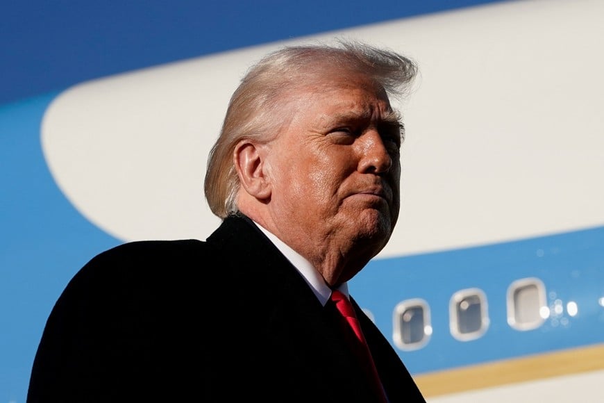 U.S. President Donald Trump looks on before boarding Air Force One en route to Florida, at Pope Army Airfield on Fort Bragg, North Carolina, U.S., February 13, 2026. REUTERS/Elizabeth Frantz