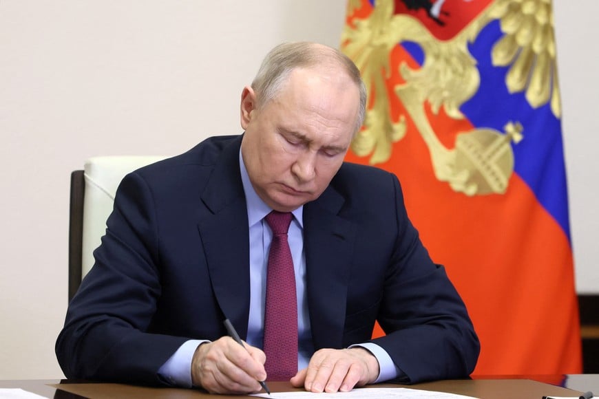 Russian President Vladimir Putin chairs a meeting with government members via a video link at the Novo-Ogaryovo state residence outside Moscow, Russia, March 14, 2024. Sputnik/Mikhail Metzel/Pool via REUTERS ATTENTION EDITORS - THIS IMAGE WAS PROVIDED BY A THIRD PARTY.