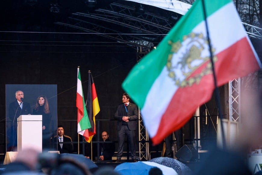 Reza Pahlavi, the exiled son of Iran's last shah and an Iranian opposition figure, and Yasmine Pahlavi attend a demonstration organised by The Munich Circle, against the Iranian government under the motto 'Freedom for Iran', during the Munich Security Conference (MSC), in Munich, Germany, February 14, 2026. REUTERS/Thilo Schmuelgen