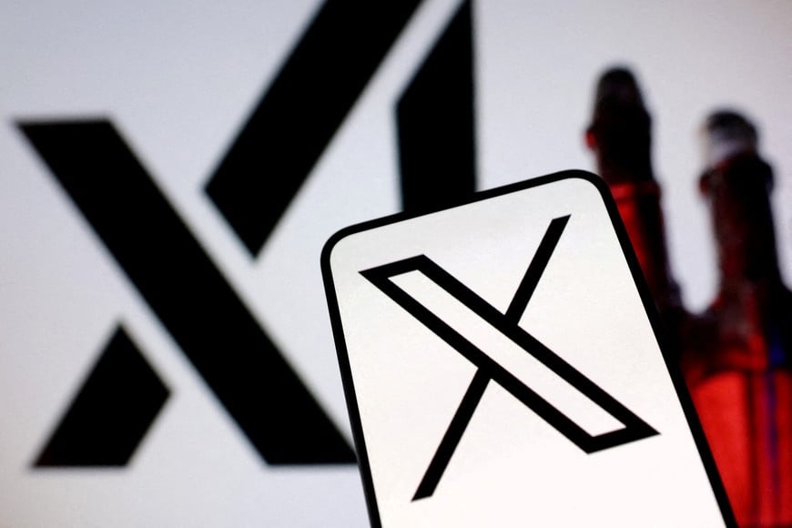 FILE PHOTO: xAI and X logos are seen in this illustration taken, March 28, 2025. REUTERS/Dado Ruvic/Illustration//File Photo