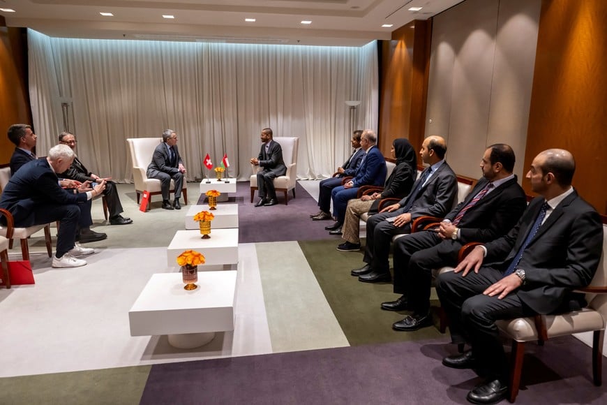 Switzerland's Foreign Minister and Federal Councillor Ignazio Cassis speaks with Omani Foreign Minister Sayyid Badr Hamad Al Busaidi during a bilateral meeting between Switzerland and Oman, in Geneva, Switzerland, February 16, 2026.  MARTIAL TREZZINI/Pool via REUTERS