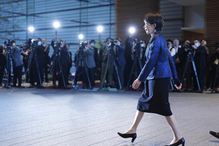 Japan's Prime Minister Sanae Takaichi arrives at the Prime Minister's office after being reelected as prime minister by the parliament, following a snap general election, in Tokyo, Japan, February 18, 2026. Kyodo/via REUTERS ATTENTION EDITORS - THIS IMAGE WAS PROVIDED BY A THIRD PARTY. MANDATORY CREDIT. JAPAN OUT. NO COMMERCIAL OR EDITORIAL SALES IN JAPAN.