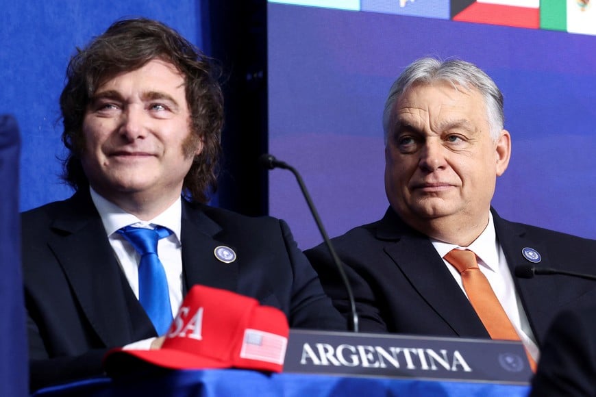 Argentina's President Javier Milei and Hungary's Prime Minister Viktor Orban attend the inaugural meeting of the Board of Peace at the U.S. Institute of Peace in Washington, D.C., U.S., February 19, 2026. REUTERS/Kevin Lamarque