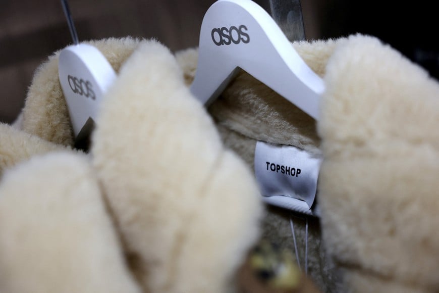 FILE PHOTO: Topshop clothes are displayed for sale in the ASOS pop-up store in London, Britain, November 12, 2025. REUTERS/Hannah McKay/File Photo