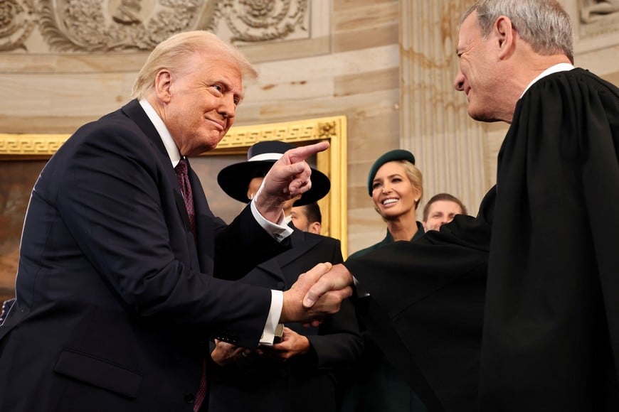 WASHINGTON, DC - JANUARY 20: U.S. President Donald Trump gestures to U.S. Supreme Court Chief Justice John Roberts after he was sworn in during inauguration ceremonies in the Rotunda of the U.S. Capitol on January 20, 2025 in Washington, DC. Donald Trump takes office for his second term as the 47th president of the United States. Chip Somodevilla/Pool via REUTERS TPX IMAGES OF THE DAY