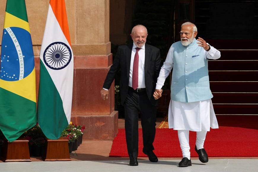 Indian Prime Minister Narendra Modi interacts with Brazilian President Luiz Inacio Lula da Silva, ahead of their meeting at Hyderabad House in New Delhi, India, February 21, 2026. REUTERS/Adnan Abidi