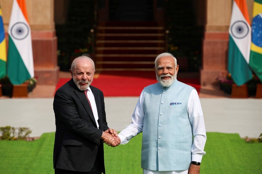 Indian Prime Minister Narendra Modi shakes hands with Brazilian President Luiz Inacio Lula da Silva, ahead of their meeting at Hyderabad House in New Delhi, India, February 21, 2026. REUTERS/Adnan Abidi