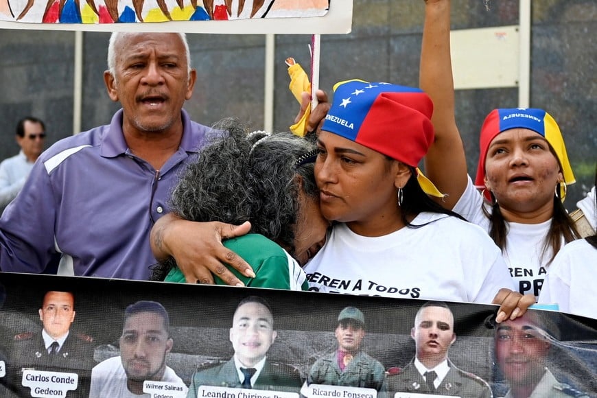 Soraida Gonzalez, mother of detainee Jose Miguel Estrada reacts as people and family members of detainees gather outside Venezuela's National Assembly as the government pledges to pass an amnesty law to free political prisoners, amid mounting U.S. pressure over a month after the administration of U.S. President Donald Trump captured and deposed long-time leader Nicolas Maduro, in Caracas, Venezuela February 10, 2026. REUTERS/Maxwell Briceno TPX IMAGES OF THE DAY