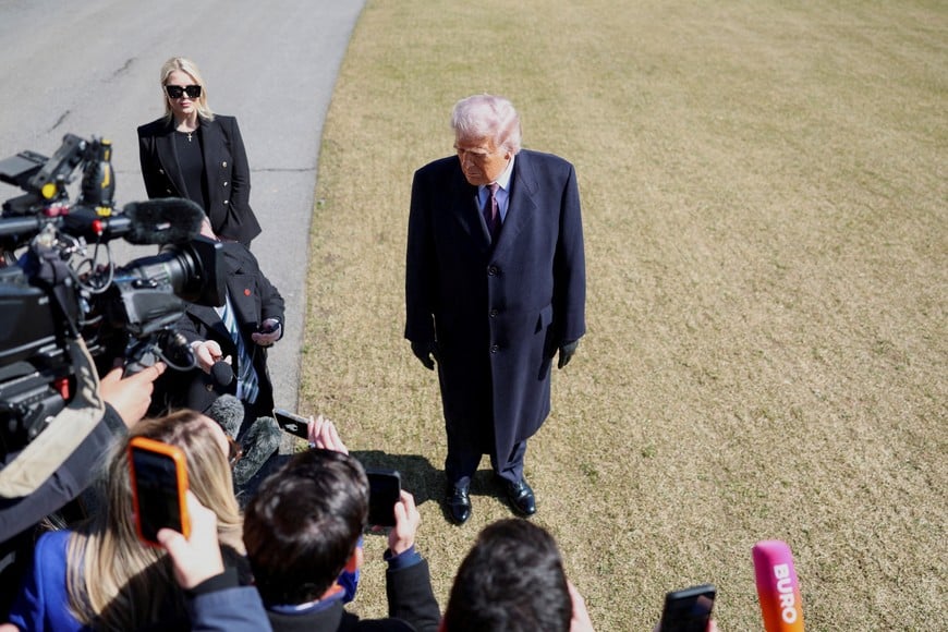 U.S. President Donald Trump speaks to the media as he departs from the White House ahead of his trip to Corpus Christi, Texas, in Washington, D.C., U.S., February 27, 2026. REUTERS/Tom Brenner     TPX IMAGES OF THE DAY