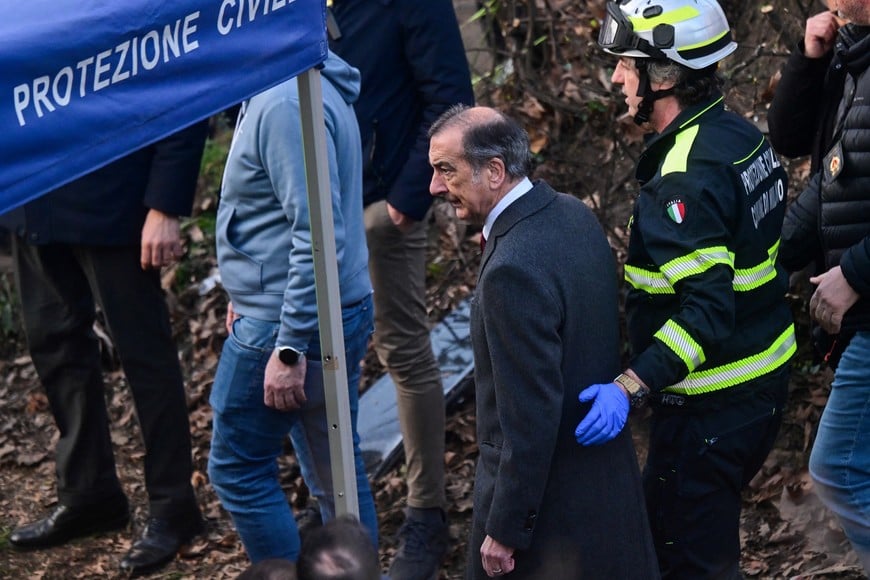 Milan Mayor Giuseppe Sala walks at the scene following a deadly tram derailment in Milan, Italy, February 27, 2026. REUTERS/Daniele Mascolo