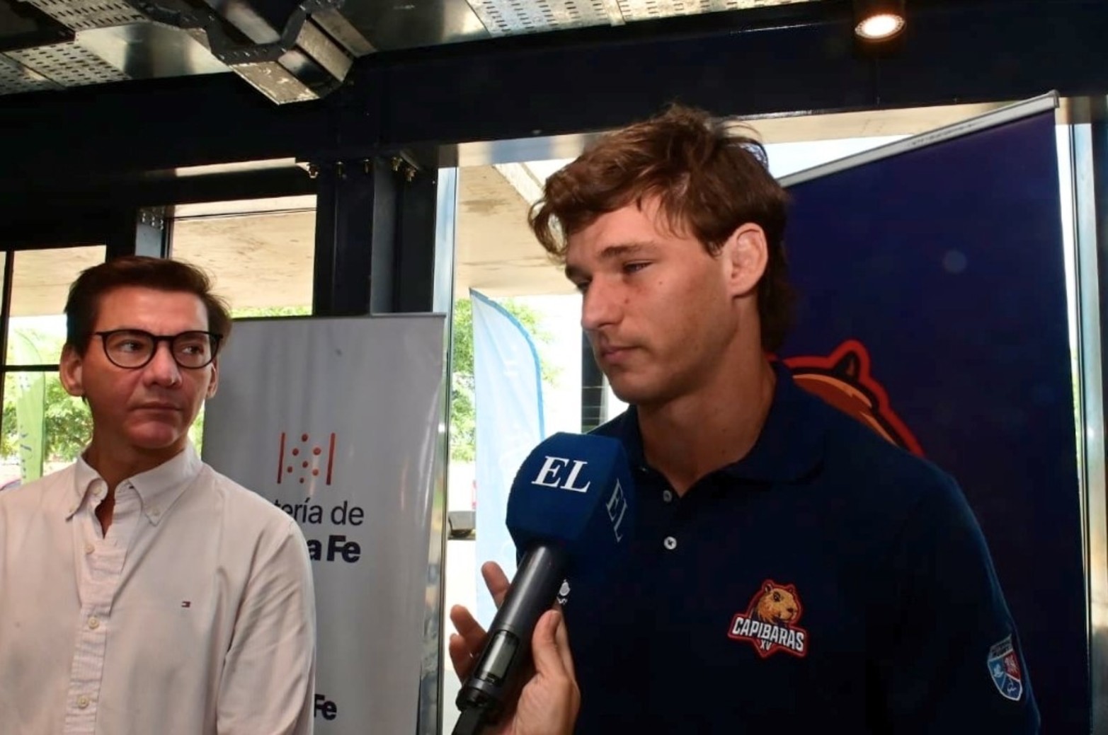Daniel Di Lena, titular de la Lotería de Santa Fe y Manuel Bernstein, segunda línea de Capibaras XV. Foto: Flavio Raina