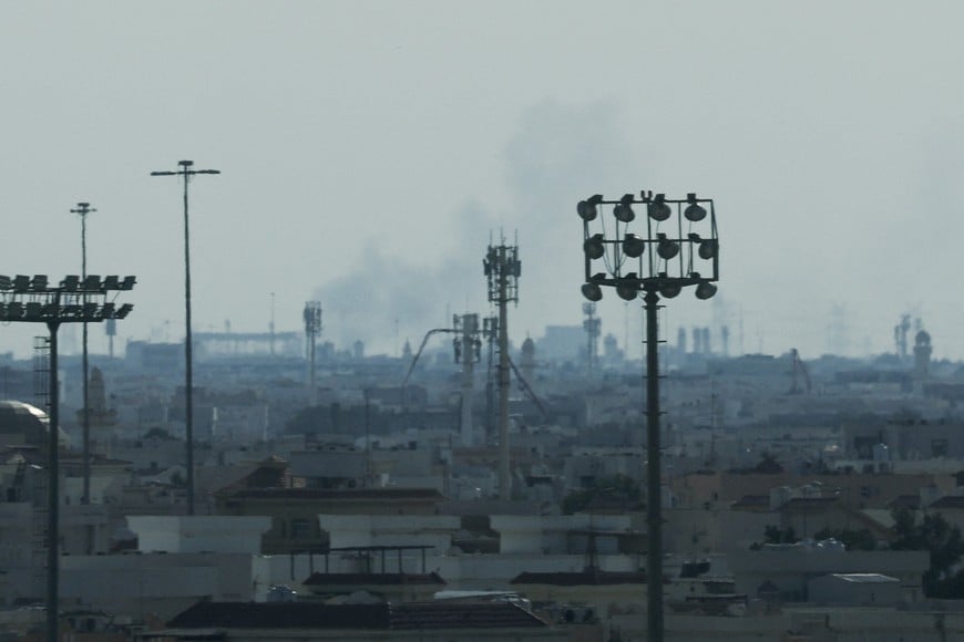 Smoke is left in the sky after reported Iranian missile attacks, following strikes by the United States and Israel against Iran, as seen from Doha, Qatar, February 28, 2026. REUTERS/Mohammed Salem
