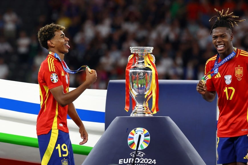 Soccer Football - Euro 2024 - Final - Spain v England - Berlin Olympiastadion, Berlin, Germany - July 14, 2024
Spain's Lamine Yamal and Nico Williams celebrate after winning the Euro 2024 REUTERS/Lee Smith