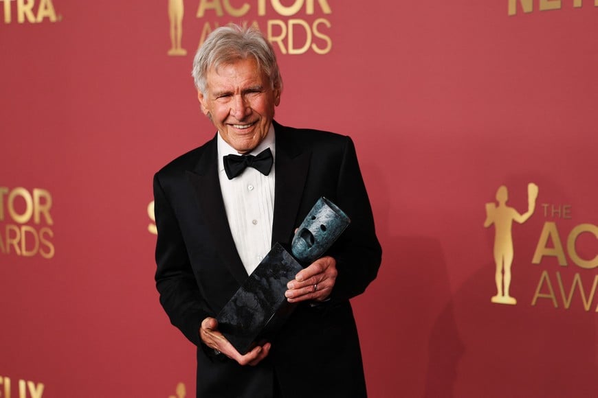 Harrison Ford poses with the Life Achievement award during the Actor Awards, in Los Angeles, California, U.S., March 1, 2026. REUTERS/Daniel Cole