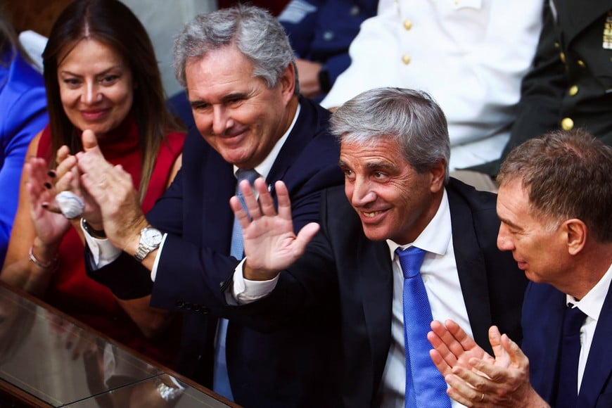 Argentina's Economy Minister Luis Caputo waves as he attends the opening session of the 144th legislative term of Congress alongwith Minister of Human Capital Sandra Pettovello, Foreign Minister Pablo Quirno and Interior Minister Diego Santilli at the National Congress building in Buenos Aires, Argentina, March 1, 2026. REUTERS/Agustin Marcarian