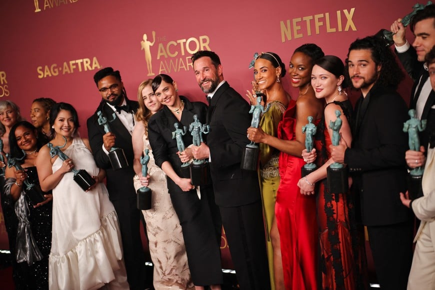 Kristin Villanueva, Brandon Mendez Homer, Taylor Dearden, Fiona Dourif, Noah Wyle, Alexandra Metz, Tracy Ifeachor, Isa Briones, Jalen Thomas Brooks and Patrick Ball pose with the Outstanding Performance by an Ensemble in a Drama Series award for "The Pitt" during the Actor Awards, in Los Angeles, California, U.S., March 1, 2026. REUTERS/Daniel Cole