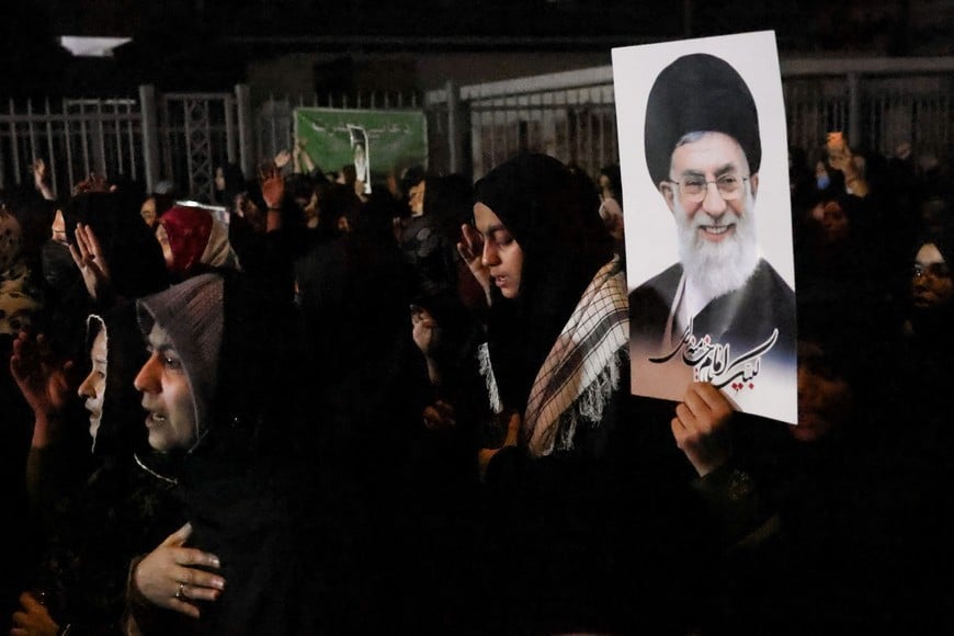 Shiite Muslim woman beast her chest while mourning the death of late Iran's Supreme Leader Ayatollah Ali Khamenei, who was killed following the U.S. and Israeli strikes on Iran, in Karachi, Pakistan, March 2, 2026. REUTERS/Akhtar Soomro