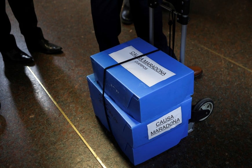 Boxes that read "Maradona Case" are moved by  Rodolfo Baque, lawyer of the former nurse of Argentine soccer player Diego Armando Maradona, Dahiana Gisela Madrid, at a courthouse for a case in which eight medical professionals and nurses are accused of manslaughter through eventual intent due to their negligence, in the death of Maradona, in San Isidro, on the outskirts of Buenos Aires, Argentina October 2, 2024. REUTERS/Matias Baglietto?