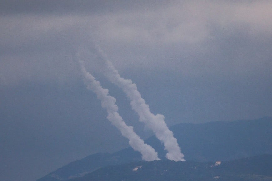 Smoke rises as projectiles are fired from Lebanon towards Israel, following an escalation between Hezbollah and Israel amid the U.S.-Israeli conflict with Iran, as seen from the Israel-Lebanon border in northern Israel, March 4, 2026. REUTERS/Shir Torem     TPX IMAGES OF THE DAY