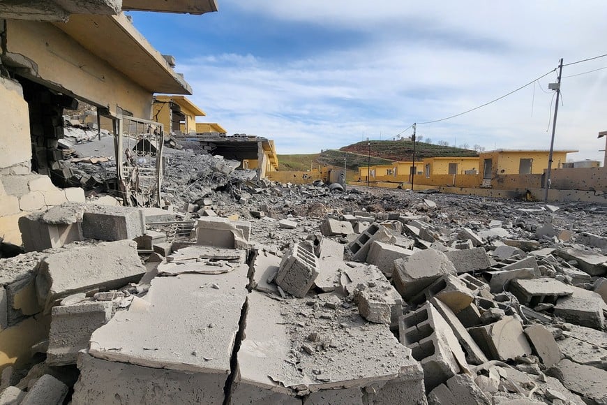 FILE PHOTO: Rubble of destroyed buildings lies following, what the security sources say, a drone struck an arms depot in an attack on the headquarters of an Iranian Kurdish opposition group in which two fighters were wounded, amid the U.S.-Israeli conflict with Iran, in the town of Dekala in Iraq's Kurdistan region March 4, 2026. REUTERS/Stringer/File Photo