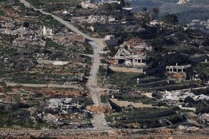 Destroyed buildings on the Lebanese side of the border, pictured from the Israeli side of the border, amid escalation between Hezbollah and Israel, amid the U.S.-Israeli conflict with Iran, in northern Israel, March 6, 2026. REUTERS/Ammar Awad