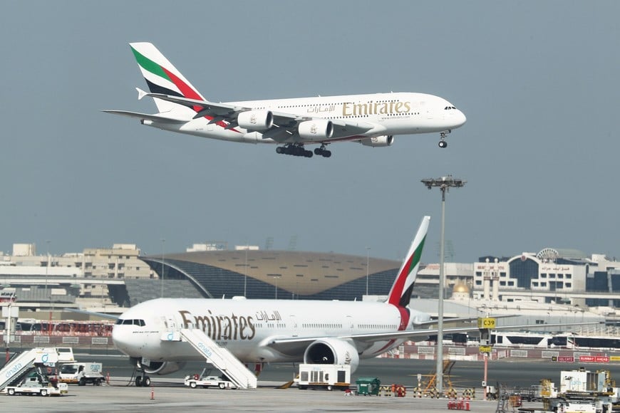 FILE PHOTO: Emirates Airlines Airbus A380-800 plane approaches for landing at Dubai Airports in Dubai, United Arab Emirates, December 26, 2018. Picture taken December 26, 2018. REUTERS/ Hamad I Mohammed/File Photo