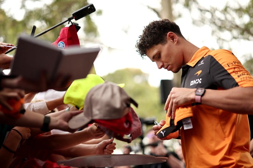 Formula One F1 - Australian Grand Prix - Albert Park Grand Prix Circuit, Melbourne, Australia - March 6, 2026
McLaren's Lando Norris with fans before practice REUTERS/Mark Peterson