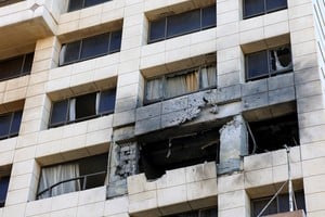 Damaged apartment in the Ramada Plaza hotel building in the aftermath of an Israeli strike, following an escalation between Hezbollah and Israel amid the U.S.-Israeli conflict with Iran, in central Beirut, Lebanon, March 8, 2026. REUTERS/Claudia Greco