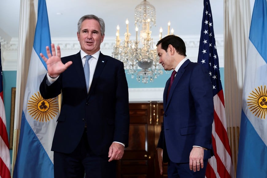 Argentine Foreign Minister Pablo Quirno gestures to the media as he meets U.S. Secretary of State Marco Rubio at the State Department in Washington, D.C., U.S., November 13, 2025. REUTERS/Evelyn Hockstein