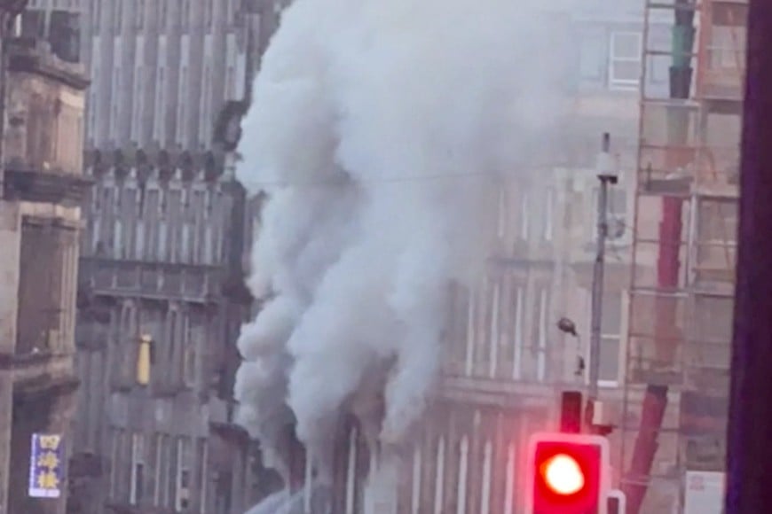 Smoke rises following fire at a building near Glasgow Central Station, in Glasgow, Scotland, Britain, March 8, 2026 in this screengrab taken from a social media video. BRUNA GOMES via Instagram/via REUTERS  THIS IMAGE HAS BEEN SUPPLIED BY A THIRD PARTY. MANDATORY CREDIT. NO RESALES. NO ARCHIVES.

VERIFICATION:
Reuters was able to confirm the location of the footage by the building, road layout, traffic lights and business signages. Building on fire as seen from the traffic crossing at coordinates: 55°51'49.7"N 4°15'21.2"W. The date of the footage was confirmed from file data.