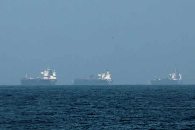 FILE PHOTO: Tankers are seen off the coast of the Fujairah, as Iran vows to close the Strait of Hormuz, amid the U.S.-Israel conflict with Iran, in Fujairah, United Arab Emirates, March 3, 2026. REUTERS/Amr Alfiky/File Photo