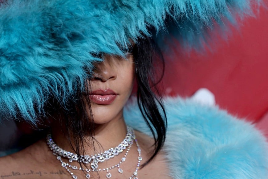 Rihanna poses on the red carpet of The Fashion Awards 2024 at the Royal Albert Hall in London, Britain, December 2, 2024. REUTERS/Hannah McKay NO COMMERCIAL OR BOOK SALES     TPX IMAGES OF THE DAY