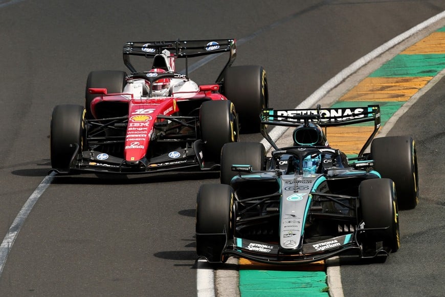 Formula One F1 - Australian Grand Prix - Albert Park Grand Prix Circuit, Melbourne, Australia - March 8, 2026
Ferrari's Charles Leclerc and Mercedes' George Russell in action during the race REUTERS/Mark Peterson