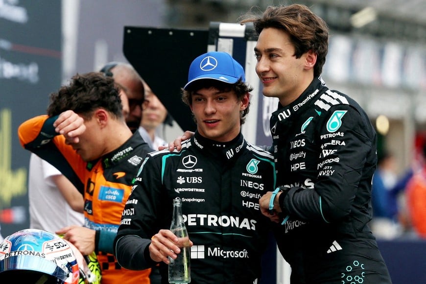 Formula One F1 - Australian Grand Prix - Albert Park Grand Prix Circuit, Melbourne, Australia - March 7, 2026
Mercedes' George Russell celebrates after qualifying in pole position with second place Mercedes' Andrea Kimi Antonelli REUTERS/Hollie Adams     TPX IMAGES OF THE DAY