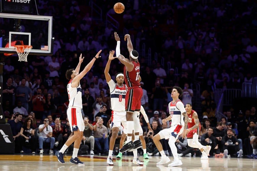 Mar 10, 2026; Miami, Florida, USA;  Miami Heat center Bam Adebayo (13) shoots against the Wshington Wizards during the second half at Kaseya Center. Mandatory Credit: Rhona Wise-Imagn Images