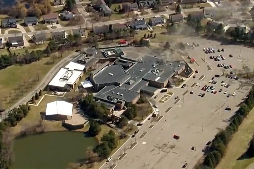 Smoke rises from the building after the Michigan State Police reported an active shooting incident at the Temple Israel Synagogue in West Bloomfield, Michigan, U.S., March 12, 2026 in a still image from video.   ABC Affiliate WXYZ via REUTERS.      NO RESALES. NO ARCHIVES. THIS IMAGE HAS BEEN SUPPLIED BY A THIRD PARTY. MANDATORY CREDIT
